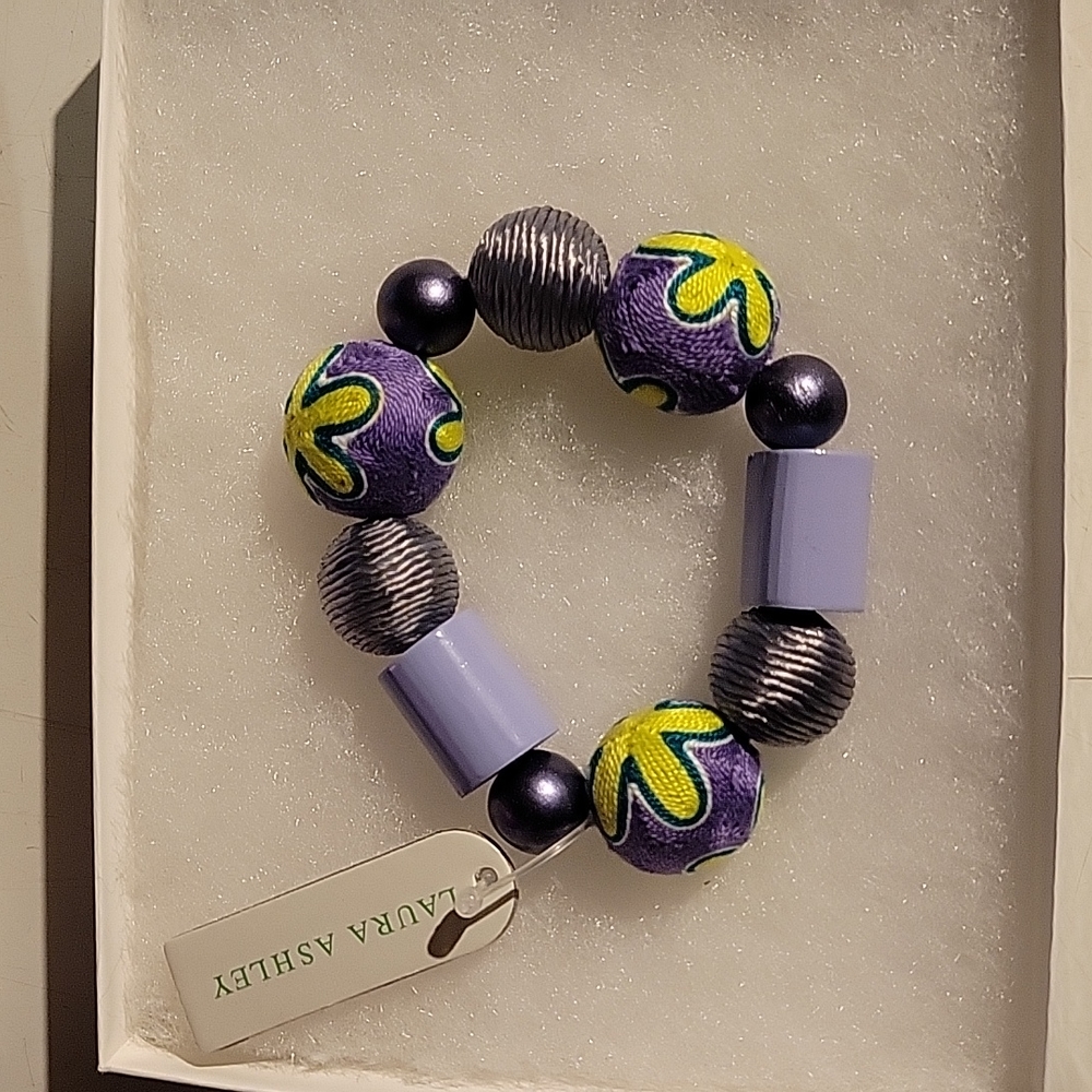 Laura Ashley Stretchable bracelet purple and green.